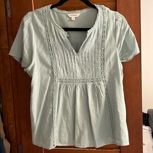 Lucky Brand Woman’s Top size small.  Light teal color.  Very pretty.